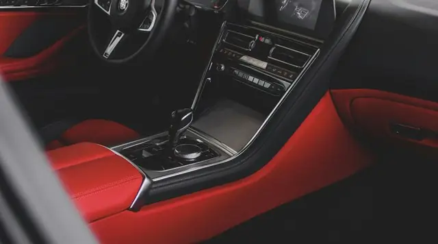 Clean red leather seats and centre console